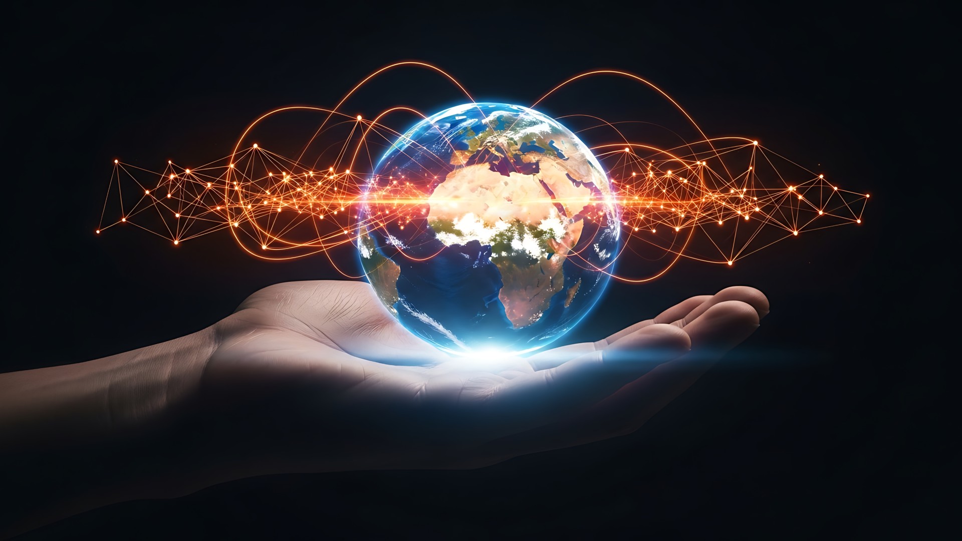 a globe floating above a hand