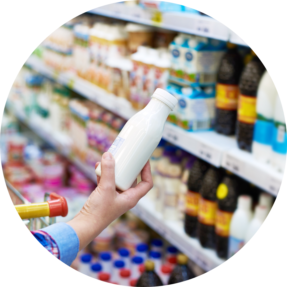 Woman shopping dairy product in grocery store