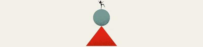 a person balancing on a ball
