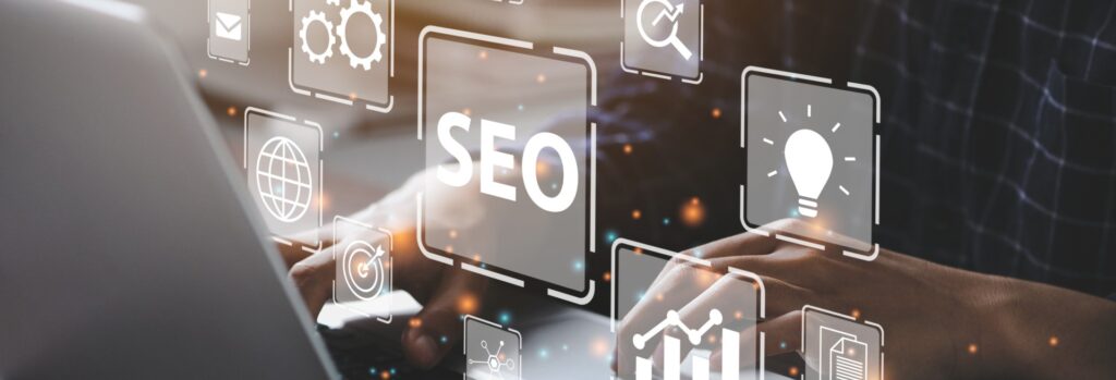 a laptop with SEO-related icons floating above it