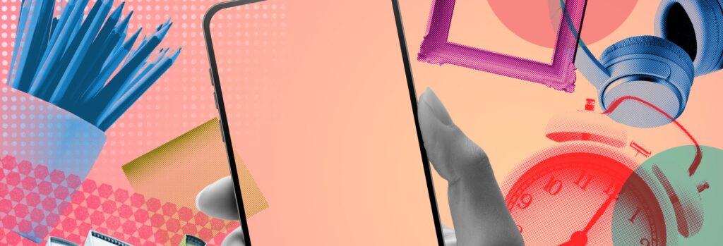 a mobile phone on a background of books and pencils