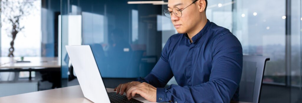 a man using a laptop