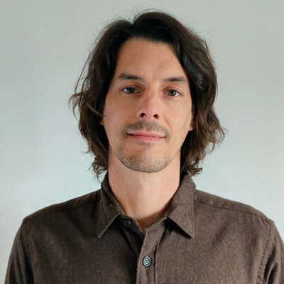 A headshot of Pedro Flores from TransPerfect Digital