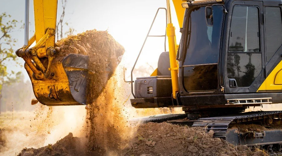 an excavator moving earth