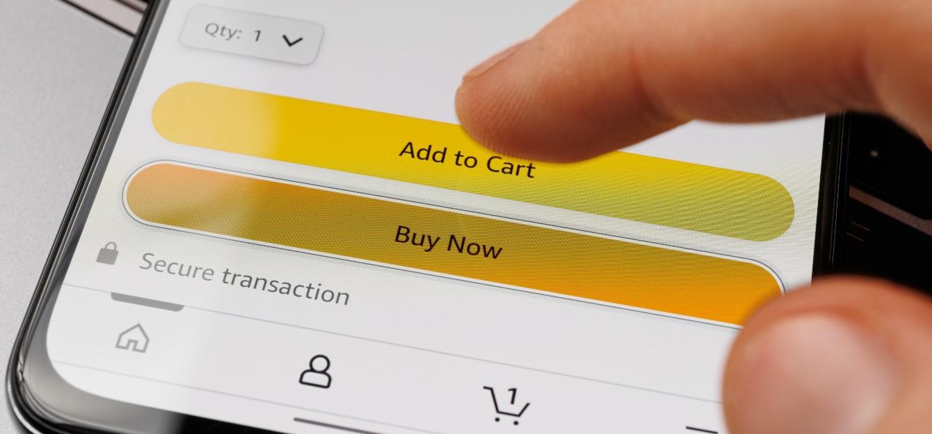 a finger hovering above the buy now button on an Amazon listing