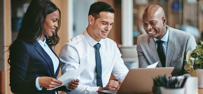 a group of three businesspeople