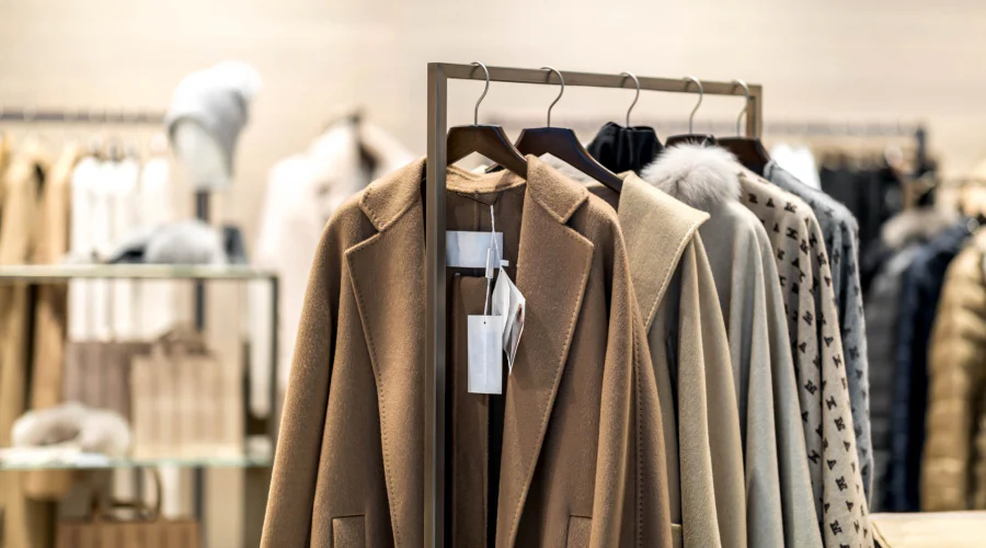 a rack of clothes in a shop