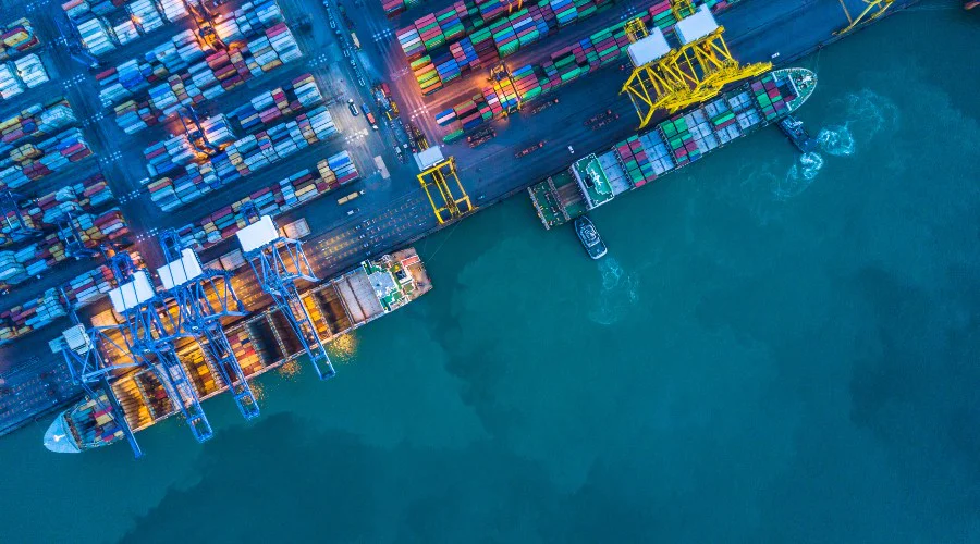 a cargo ship at a dock